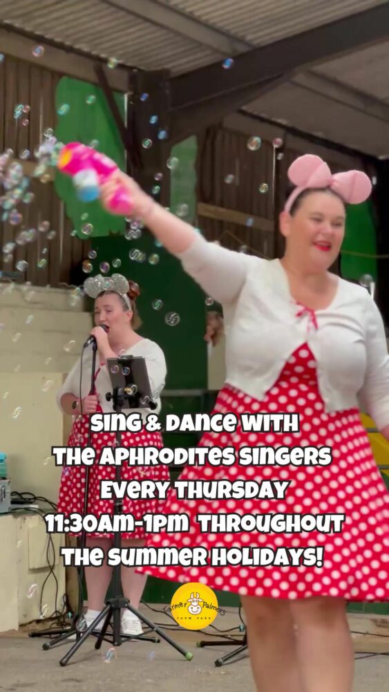 APHRODITE SINGERS ENTERTAINING CHILDREN WITH SONGS AND BUBBLES AT FARMER PALMERS