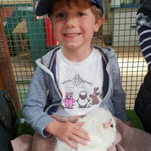 boy Holding a Guinea pig