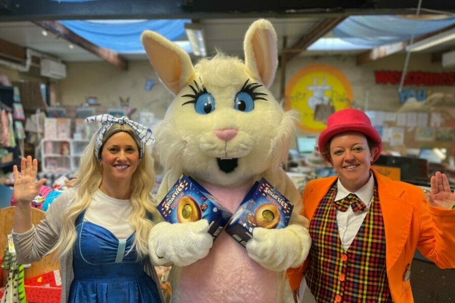 Easter egg hunts and easter bunny with two girls at Farmer Palmers