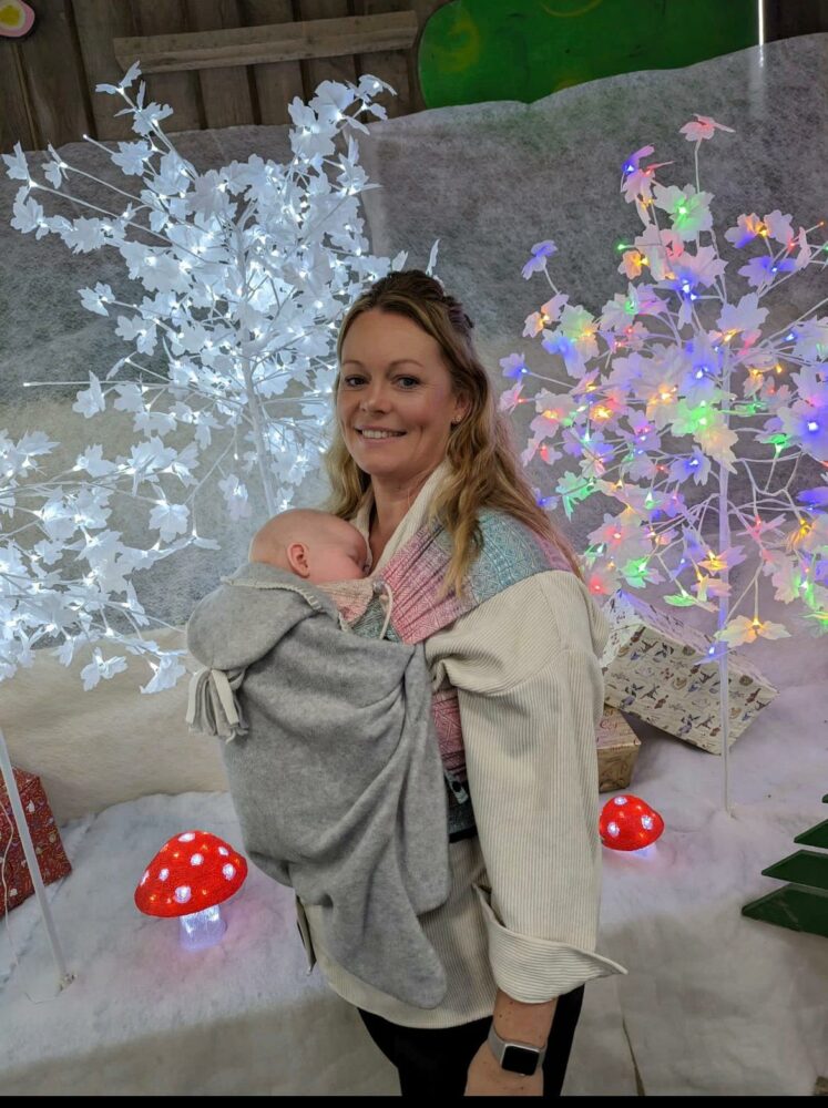 Mum with new baby at Christmas